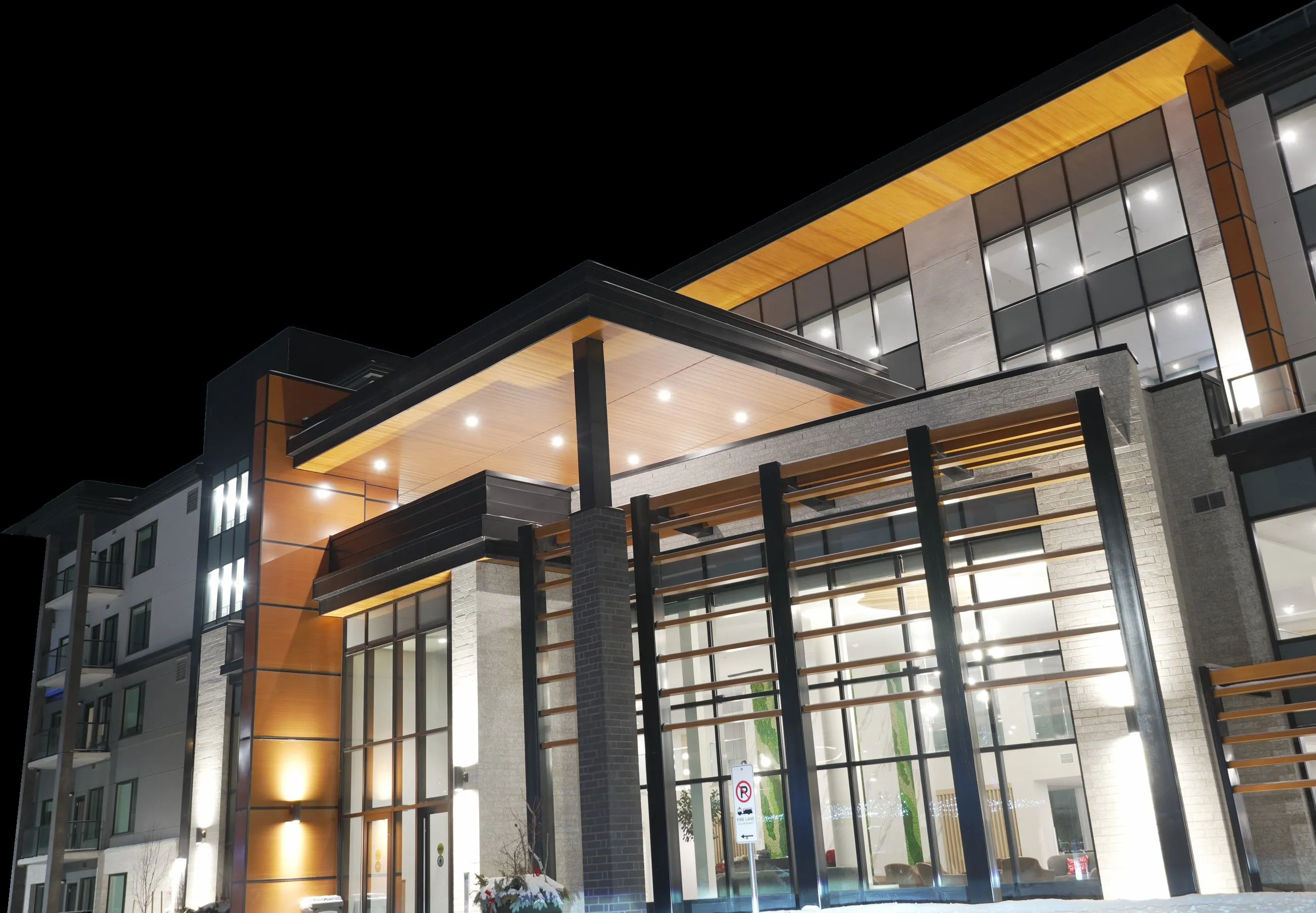 Modern residential building clad in metal panels at dusk